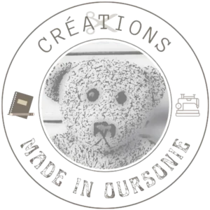 Logo de l’entreprise Made in Oursonie, représentant un ourson stylisé dans un cercle, avec une police manuscrite évoquant l’artisanat et la créativité.